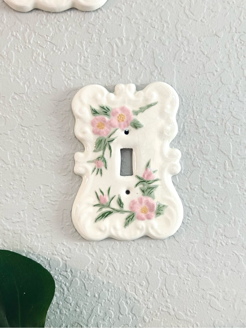 2 vintage switch plates